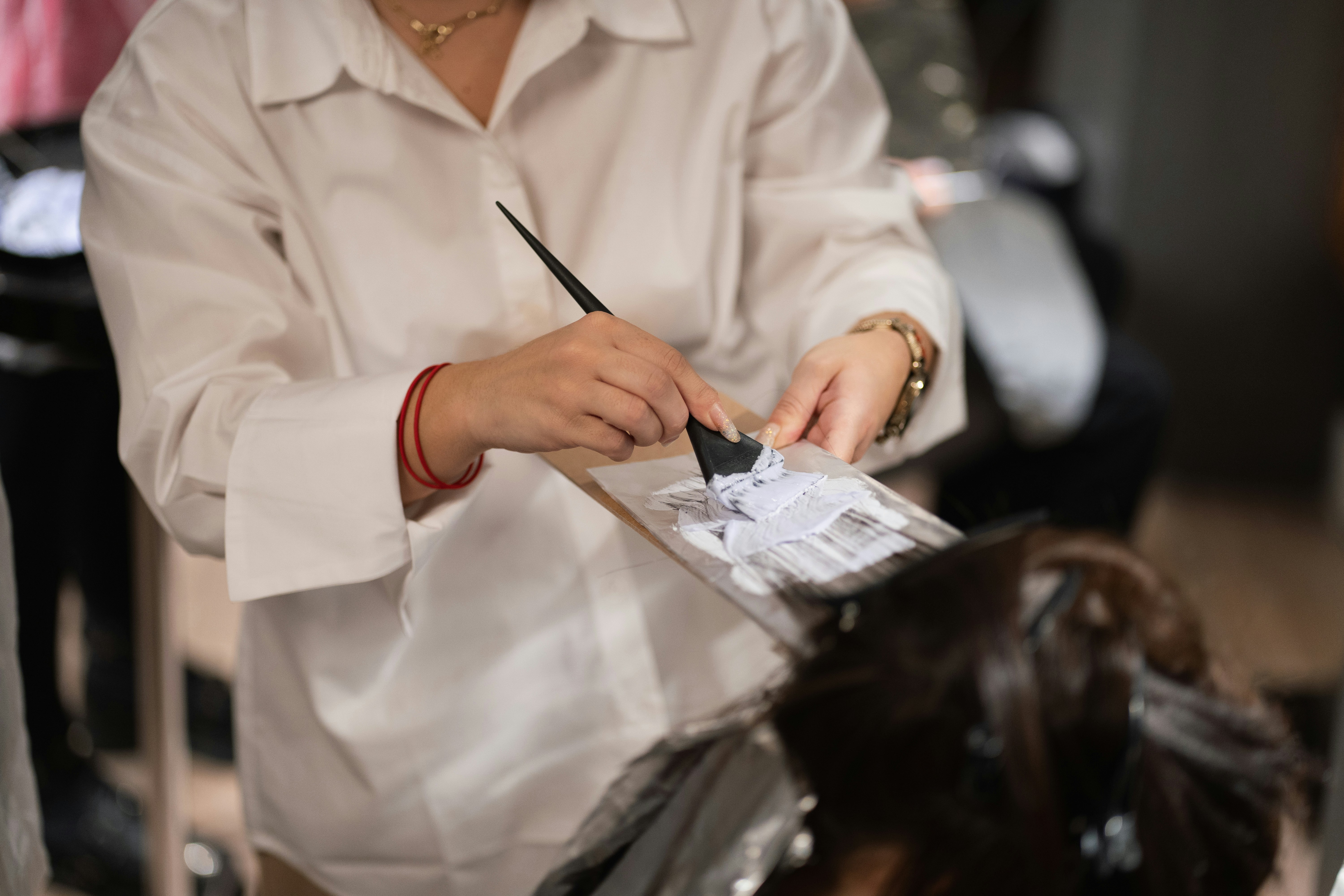 Applying a hair treatment serum